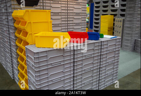 Stack of industrial open plastic bin rack Stock Photo