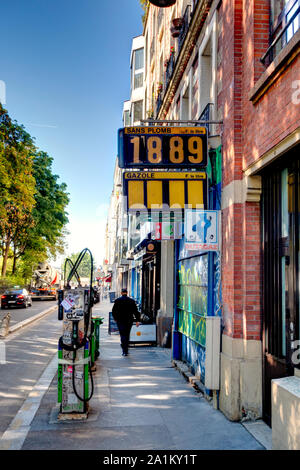 Old gas station in Paris, with the price in French Francs Stock Photo