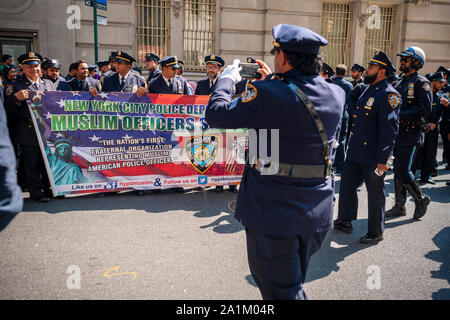 Muslim NYPD officers on Madison Avenue  in New York on Sunday, September 22, 2019 for the 32nd annual American Muslim Parade. (© Richard B. Levine) Stock Photo