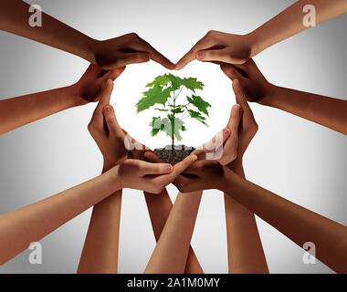 Earthday or earth day as group of diverse people joining to form heart hands connected together protecting the environment and promoting.