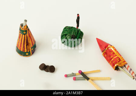 Close up of different types of Diwali Firecrackers on isolated background with copy space. Stock Photo