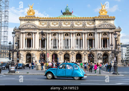 The Paris Opera or Palais Garnier, Place de l'Opera, Paris, France with a classic French Citroen CV2 car Stock Photo