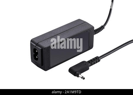 Plastic laptop power adapter on a white background isolated. Stock Photo