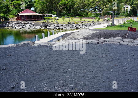 The boat launch at Isaac Hale Beach Park became completely landlocked after new beachfront was formed from the 2018 eruptions of Kilauea volcano. Stock Photo