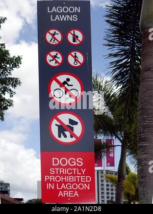 A sign in a park showing prohibited six items in a lagoon area Stock Photo