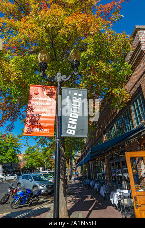 Oregon, Bend, Downtown, Wall Street, Film Festival banner, sidewalk restaurant, fall season Stock Photo