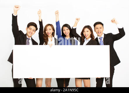 business people standing and holding blank board Stock Photo