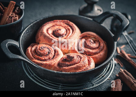 Tasty cinnamon buns as swedish christmas dessert. Stock Photo