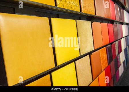 Coloured swatches of leather grouped by colour Stock Photo