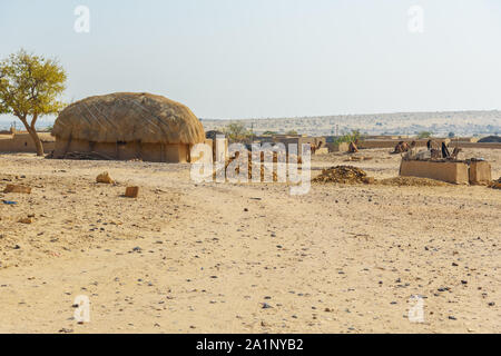 Traditional houses in village in Thar desert. Jaisalmer. Rajasthan. India Stock Photo