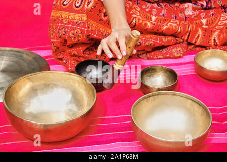 Tibetan singing bowl on the pink background Stock Photo