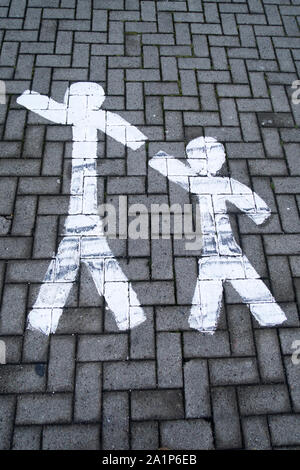 Parking bay reserved for families and children in a shopping center Stock Photo