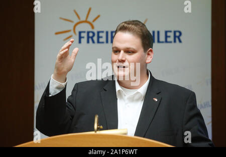 28 September 2019, Mecklenburg-Western Pomerania, Rostock: Deputy Federal Chairman Gregor Voth (Free Voters) speaks to the members at the State Party Congress of Free Voters Mecklenburg-Western Pomerania. At the state party conference, the free voters of Mecklenburg-Western Pomerania will elect their new executive committee. Photo: Danny Gohlke/dpa Stock Photo