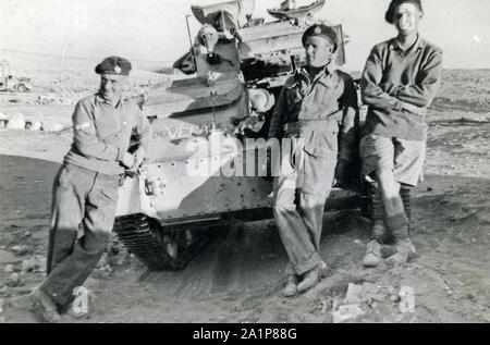 Photographs taken during WW2 by British soldier of the Royal Tank Regiment during the North Africa campaign. 3 British soldiers with their tank at Tobruk, 1941.  Trooper C M Shoults Stock Photo