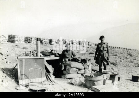 Photographs taken during WW2 by British soldier of the Royal Tank Regiment during the North Africa campaign. British soldiers outside a dugout at Fort Palastrina, Tobruk,1941.  Trooper C M Shoults Stock Photo