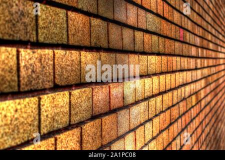Textured brick wall converging lines Stock Photo