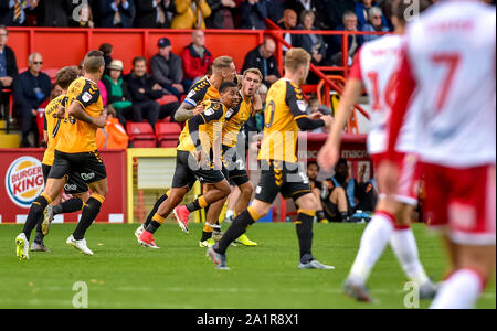 Stevenage, UK. 28th Sep, 2019. The Cambridge team congratulate Sam Smith of Cambridge United FC for scoring Cambridge's equaliser during the second half of the EFL Sky Bet League 2 match between Stevenage and Cambridge United at the Lamex Stadium, Stevenage, England on 28 September 2019. Photo by Phil Hutchinson. Editorial use only, license required for commercial use. No use in betting, games or a single club/league/player publications. Credit: UK Sports Pics Ltd/Alamy Live News Stock Photo