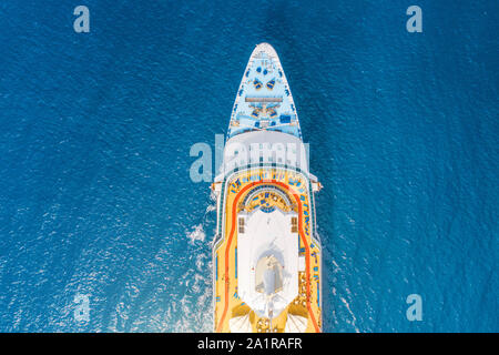 Close up aerial top view nose of the cruise ship in the turquoise sea. Concept of summer sea cruise tours Stock Photo