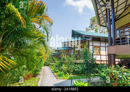 Guest accomodation, bungalow chalet cottages in Infinity Resorts hotel in Kaziranga, Golaghat District, Bochagaon, Assam, India Stock Photo