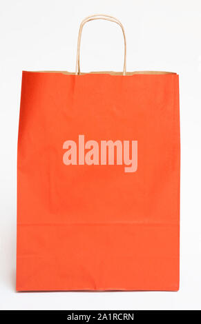 Red paper bag on white background Stock Photo
