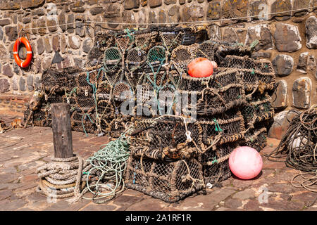Lobster pots at Clovelly harbour on the north Devon coast Stock Photo