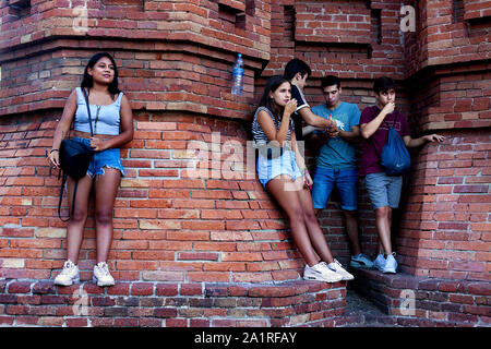 Young people hanging out at La Mercè, Barcelona. Stock Photo