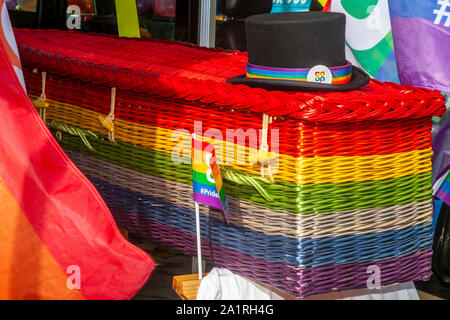 Custom LGBT hearse and coffin in Preston, Lancashire. UK Entertainment. September 2019. A sunny afternoon for the 8th annual city Gay Pride Festival held in the Flag Market. Coop Funeral Care Rainbow hearse and willow, wickerwork, plaited or woven twigs, or osiers casket; Stock Photo