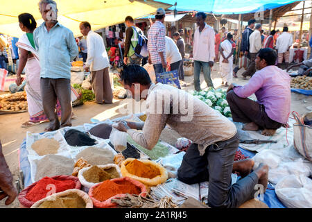 Farmers and sellers with their products on the stalls on market day in Missamari, Assam State, India Stock Photo