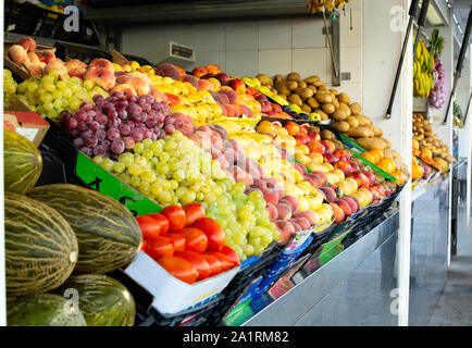 Fresh harvested fruits and vegetables from farmer for sale on weekly spanish market in Andalusia, Spain, close up Stock Photo