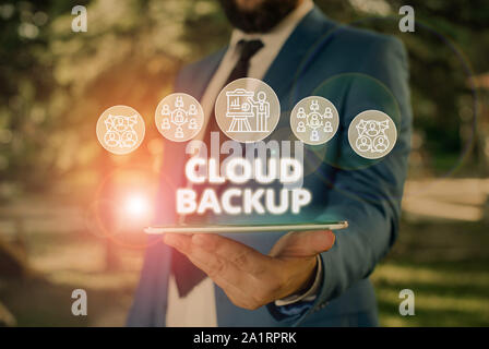 Word writing text Cloud Backup. Business photo showcasing enable customers to remotely access the provider s is services Male human wear formal work s Stock Photo