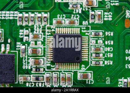 Close up blank microchip on Electronic circuit board. Stock Photo