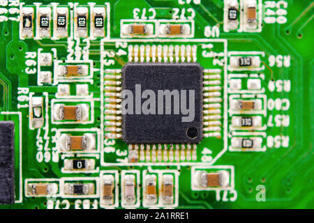 Close up blank microchip on Electronic circuit board. Stock Photo