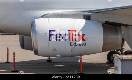 Engine of FedEx cargo plane with FedEx Express logo on the side at Toronto Pearson Intl. Airport. Stock Photo