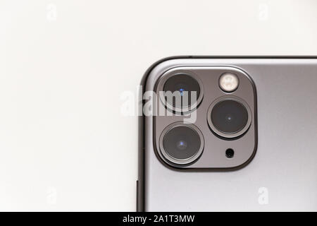 Close-up of new 3 camera design on Space Grey, iPhone 11 Pro Max. Stock Photo