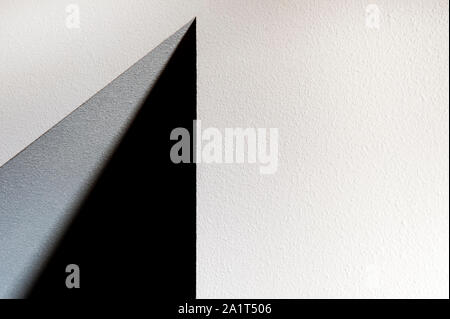 Abstract shapes interior wall with triangles in black and white Stock Photo
