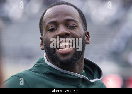 East Lansing, Michigan, USA. 28th Sep, 2019. Golden State Warriors forward DRAYMOND GREEN walks the sidelines before the Michigan State's game against Indiana at Spartan Stadium. Credit: Scott Mapes/ZUMA Wire/Alamy Live News Stock Photo