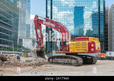 Excavator working at a construction site in downtown Toronto Ontario Canada. Stock Photo