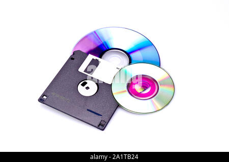 data storing item such as dvd and disket on white background Stock Photo