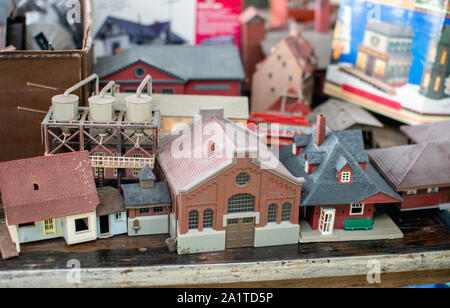 Model train hobbyists enjoy these small model houses, and add them to model railroad layouts to make the set look real, just miniature Stock Photo