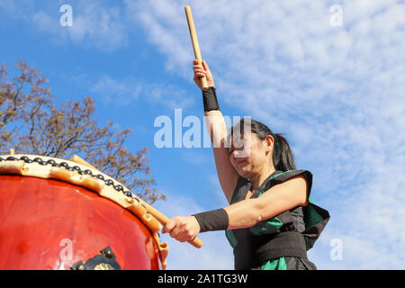 Montevideo, Uruguay. 28th Sep, 2019. A member of Montevideo Taiko seen playing drums during the Japan Fest 2019 in Montevideo.Every year, the Japanese Embassy in Uruguay organizes the Japan festival with the idea of making Japanese culture known in Uruguay, the Japan Festival shows martial arts, gastronomy, dance, music and floriculture to the Uruguayan people. Credit: SOPA Images Limited/Alamy Live News Stock Photo