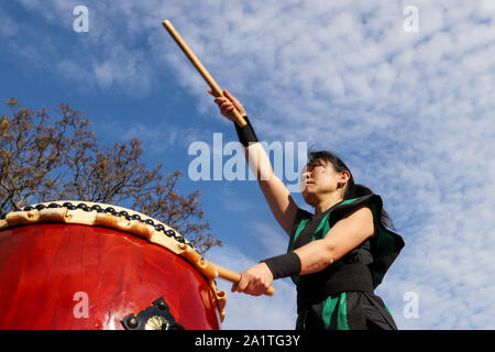 Montevideo, Uruguay. 28th Sep, 2019. A member of Montevideo Taiko seen playing drums during the Japan Fest 2019 in Montevideo.Every year, the Japanese Embassy in Uruguay organizes the Japan festival with the idea of making Japanese culture known in Uruguay, the Japan Festival shows martial arts, gastronomy, dance, music and floriculture to the Uruguayan people. Credit: SOPA Images Limited/Alamy Live News Stock Photo