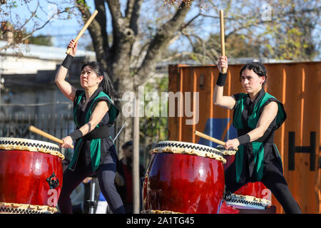 Montevideo, Uruguay. 28th Sep, 2019. Members of Montevideo Taiko seen playing drums during the Japan Fest 2019 in Montevideo.Every year, the Japanese Embassy in Uruguay organizes the Japan festival with the idea of making Japanese culture known in Uruguay, the Japan Festival shows martial arts, gastronomy, dance, music and floriculture to the Uruguayan people. Credit: SOPA Images Limited/Alamy Live News Stock Photo