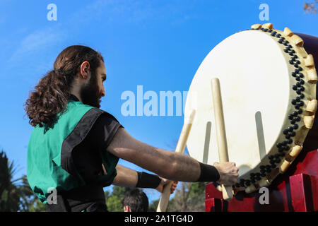 Montevideo, Uruguay. 28th Sep, 2019. A member of Montevideo Taiko seen playing drums during the Japan Fest 2019 in Montevideo.Every year, the Japanese Embassy in Uruguay organizes the Japan festival with the idea of making Japanese culture known in Uruguay, the Japan Festival shows martial arts, gastronomy, dance, music and floriculture to the Uruguayan people. Credit: SOPA Images Limited/Alamy Live News Stock Photo