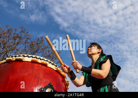 Montevideo, Uruguay. 28th Sep, 2019. A member of Montevideo Taiko seen playing drums during the Japan Fest 2019 in Montevideo.Every year, the Japanese Embassy in Uruguay organizes the Japan festival with the idea of making Japanese culture known in Uruguay, the Japan Festival shows martial arts, gastronomy, dance, music and floriculture to the Uruguayan people. Credit: SOPA Images Limited/Alamy Live News Stock Photo