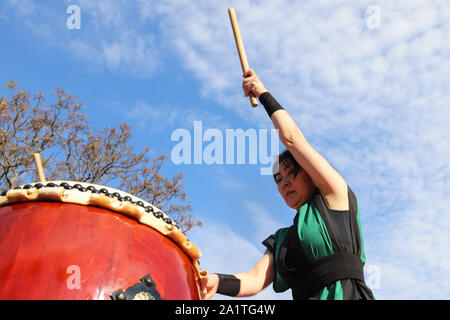 Montevideo, Uruguay. 28th Sep, 2019. A member of Montevideo Taiko seen playing drums during the Japan Fest 2019 in Montevideo.Every year, the Japanese Embassy in Uruguay organizes the Japan festival with the idea of making Japanese culture known in Uruguay, the Japan Festival shows martial arts, gastronomy, dance, music and floriculture to the Uruguayan people. Credit: SOPA Images Limited/Alamy Live News Stock Photo