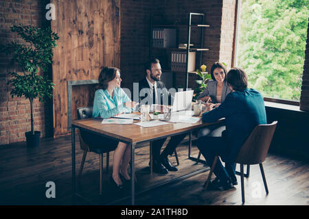 Four glad careless cheerful professional collar occupation perso Stock Photo