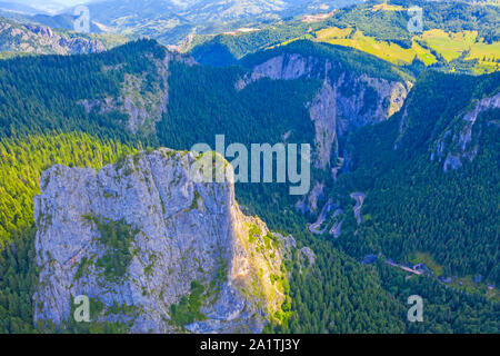 Rocky mountain pass in Romanian Carpathians, road on valley. Stock Photo