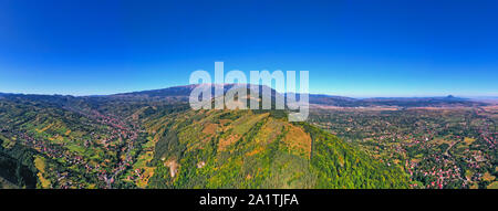 Bran is an important touristic destination in Romania, autumn mountain landscape panorama from above Stock Photo