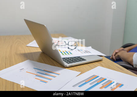 Working table with financial document reports Stock Photo