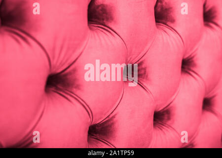 Furniture design, classic interior and royal vintage material concept - Pink luxury velour quilted sofa upholstery with buttons, elegant home decor te Stock Photo